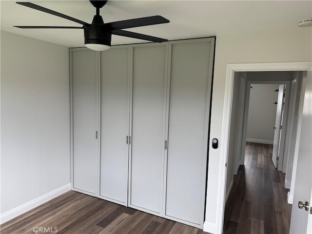 1176 Waxwing Dr, Vista, CA 92083 - unfurnished bedroom with dark wood-style floors, a closet, baseboards, and ceiling fan