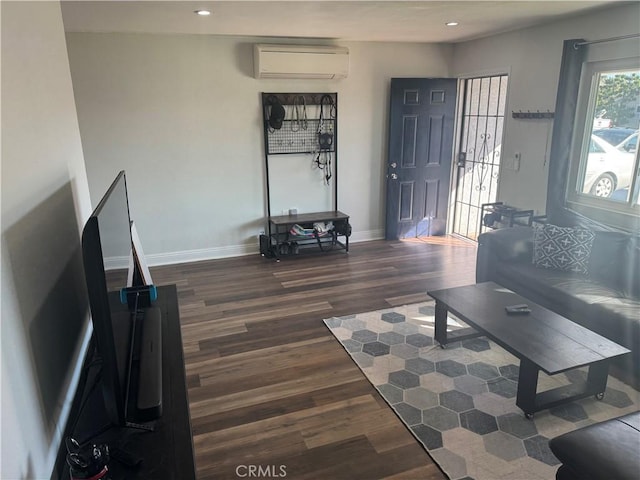 1176 Waxwing Dr, Vista, CA 92083 - living area with a wall mounted AC, dark wood-type flooring, baseboards, and recessed lighting