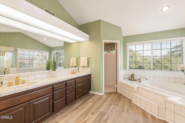 2210 Via Loma, Camarillo, CA 93012 - full bathroom with vaulted ceiling, a bath, double vanity, wood finished floors, and a shower with shower door