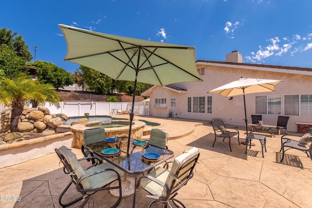 2210 Via Loma, Camarillo, CA 93012 - fenced backyard with an in-ground hot tub, a patio, and outdoor dining space