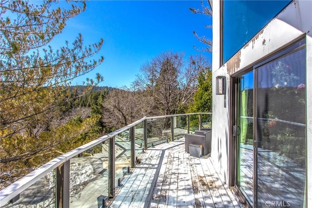 balcony with a forest view