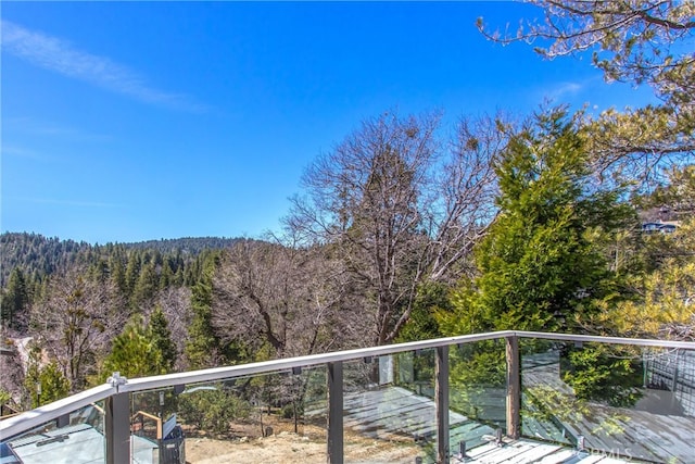 balcony with a wooded view