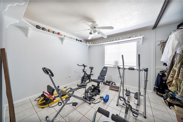 39240 Gunsmoke Ct, Palmdale, CA 93551 - exercise area featuring a ceiling fan, a textured ceiling, and light tile patterned flooring