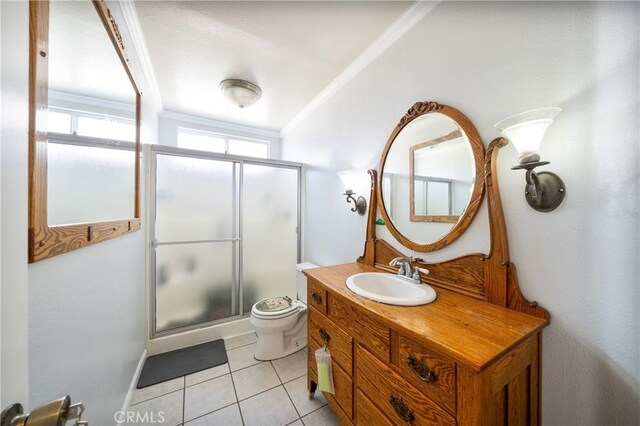 39240 Gunsmoke Ct, Palmdale, CA 93551 - bathroom featuring tile patterned floors, a stall shower, toilet, and vanity