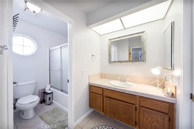 39240 Gunsmoke Ct, Palmdale, CA 93551 - full bathroom with tile patterned floors, vanity, toilet, and enclosed tub / shower combo