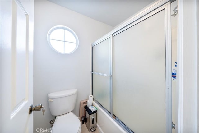 39240 Gunsmoke Ct, Palmdale, CA 93551 - full bathroom featuring toilet and shower / bath combination with glass door