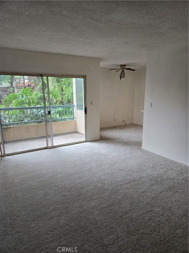 18307 Burbank Blvd Unit 7, Tarzana, CA 91356 - spare room with carpet flooring, a ceiling fan, and a textured ceiling