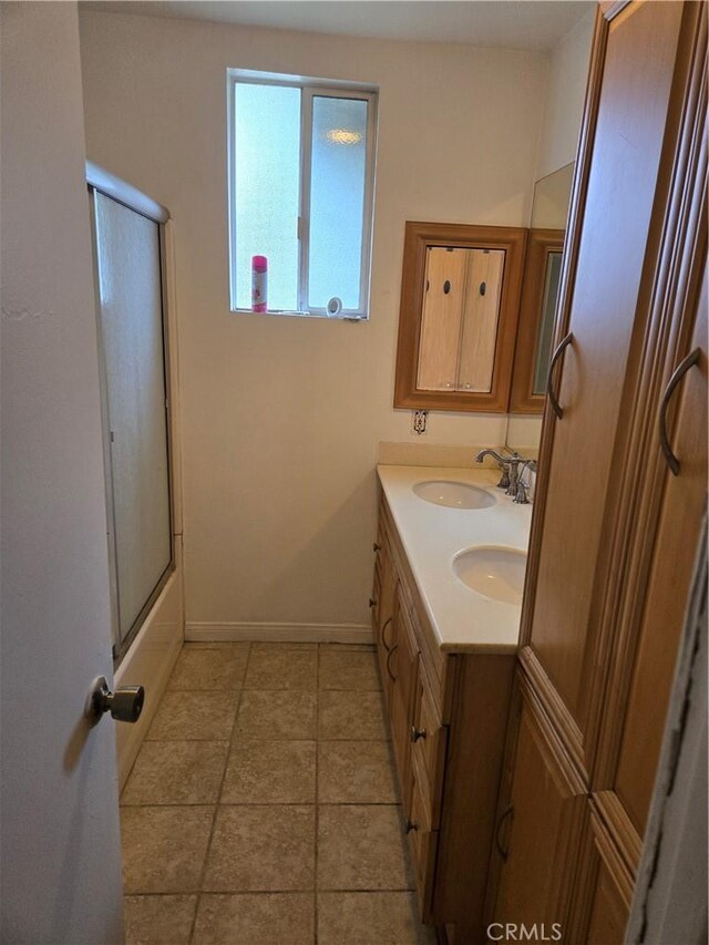 18307 Burbank Blvd Unit 7, Tarzana, CA 91356 - full bathroom featuring double vanity and tile patterned floors