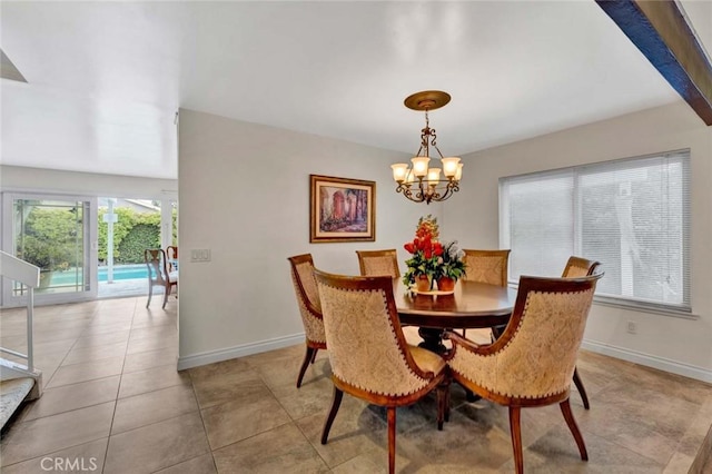937 Carnation Ave, Costa Mesa, CA 92626 - dining space featuring a chandelier and light tile patterned floors