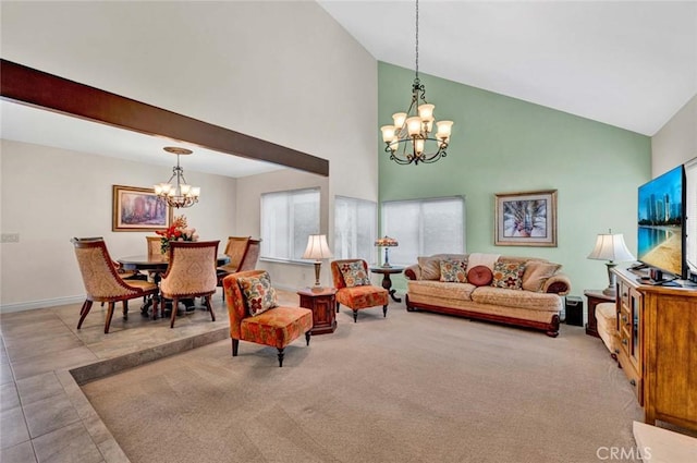 living area featuring a chandelier, high vaulted ceiling, and baseboards