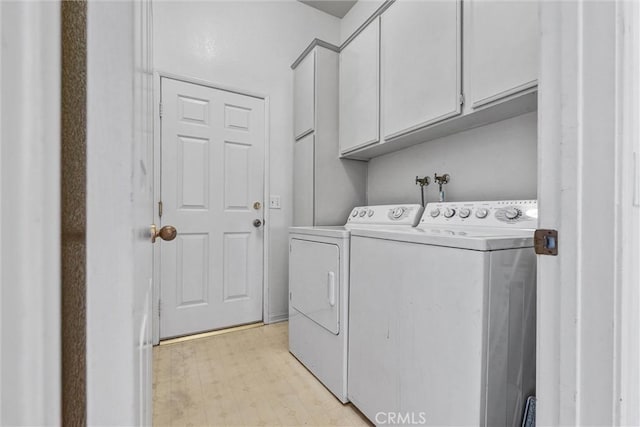 6845 Shubin Ln, Whittier, CA 90606 - laundry room featuring light floors, cabinet space, and washer and clothes dryer