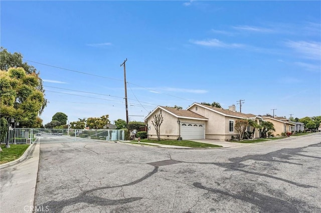 6845 Shubin Ln, Whittier, CA 90606 - view of street featuring a gate and curbs