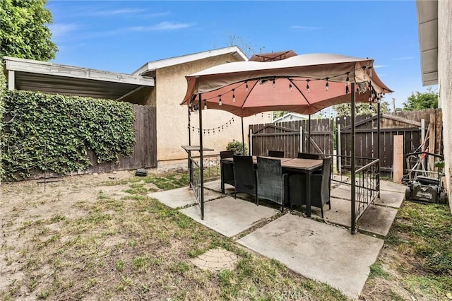 6845 Shubin Ln, Whittier, CA 90606 - view of patio / terrace with a fenced backyard, a gazebo, and outdoor dining space
