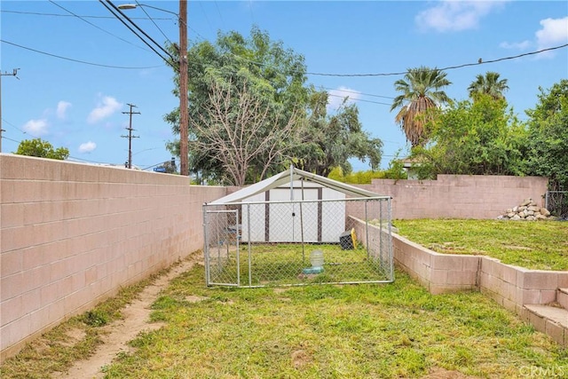 1844 Alston Ave, Colton, CA 92324 - fenced backyard with a storage unit