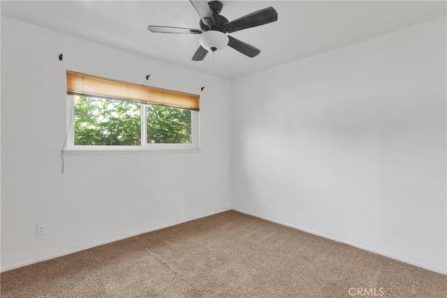 1844 Alston Ave, Colton, CA 92324 - spare room with carpet floors and a ceiling fan