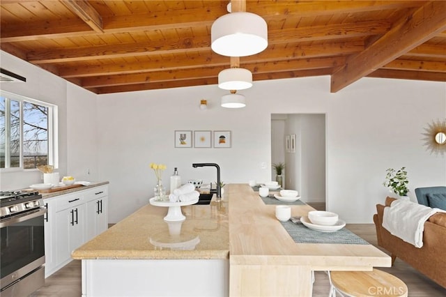 52024 Nehlsen Rd, Johnson Valley, CA 92285 - dining area featuring beam ceiling, light wood finished floors, and wooden ceiling