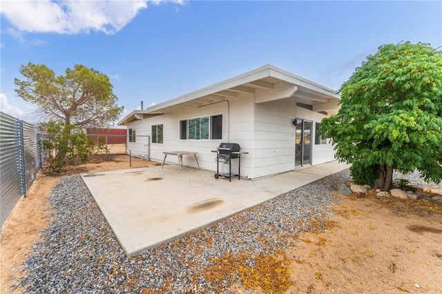 52024 Nehlsen Rd, Johnson Valley, CA 92285 - rear view of property featuring a fenced backyard and a patio area