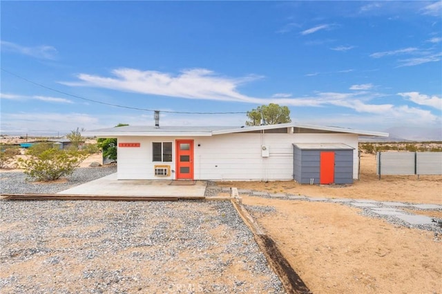 52024 Nehlsen Rd, Johnson Valley, CA 92285 - exterior space with fence, an outbuilding, and a storage shed