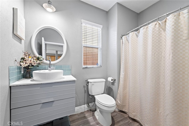 5332 Trailhawk Ave, Fontana, CA 92336 - bathroom with toilet, baseboards, wood finished floors, and vanity