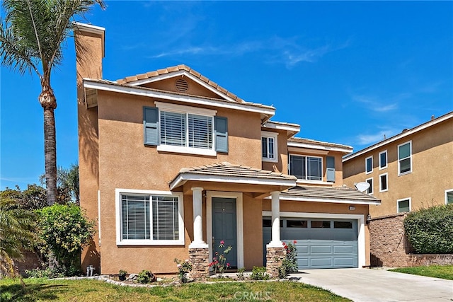 5332 Trailhawk Ave, Fontana, CA 92336 - traditional home featuring concrete driveway, an attached garage, a tile roof, and stucco siding
