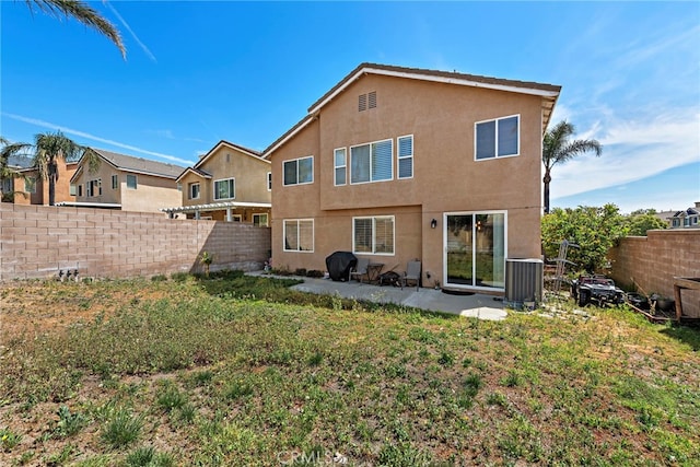 5332 Trailhawk Ave, Fontana, CA 92336 - rear view of property with a patio, central AC unit, stucco siding, and a fenced backyard