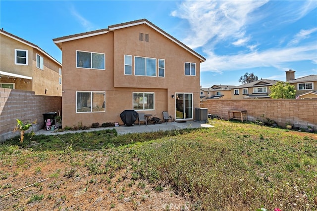 5332 Trailhawk Ave, Fontana, CA 92336 - rear view of house featuring stucco siding, a fenced backyard, a patio area, and central AC