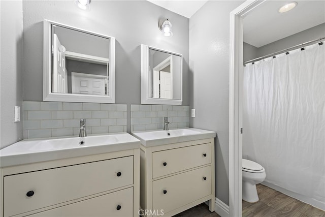 5332 Trailhawk Ave, Fontana, CA 92336 - bathroom featuring vanity, tasteful backsplash, toilet, and wood finished floors