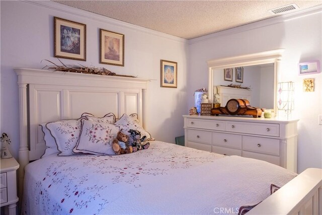 1709 S Helen Ave, Ontario, CA 91762 - bedroom with visible vents, a textured ceiling, and ornamental molding