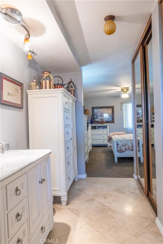 1709 S Helen Ave, Ontario, CA 91762 - ensuite bathroom featuring a ceiling fan, tile patterned flooring, vanity, and ensuite bathroom