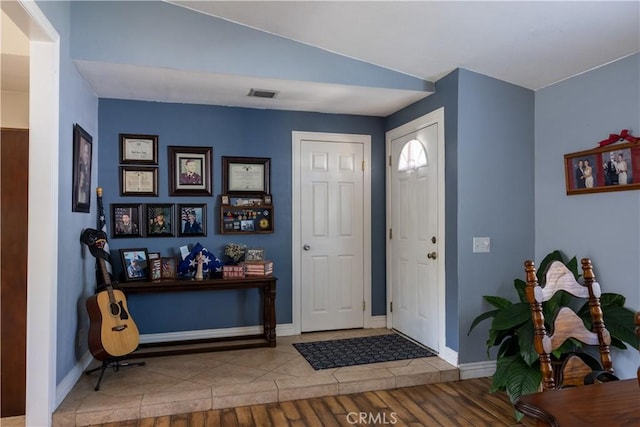 1709 S Helen Ave, Ontario, CA 91762 - tiled foyer entrance with visible vents and baseboards