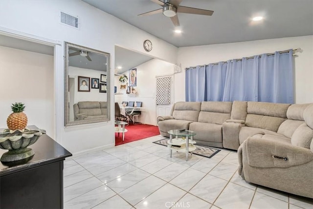 living room featuring marble finish floor, vaulted ceiling, visible vents, and a ceiling fan