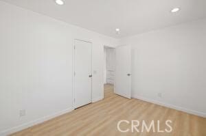 35328 80th St, Littlerock, CA 93543 - empty room featuring wood finished floors, recessed lighting, and baseboards