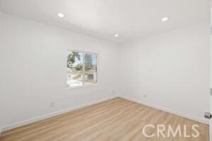 35328 80th St, Littlerock, CA 93543 - unfurnished room with baseboards, wood finished floors, and recessed lighting