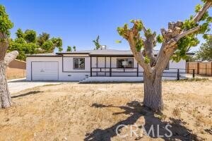 35328 80th St, Littlerock, CA 93543 - view of front facade with a garage and concrete driveway