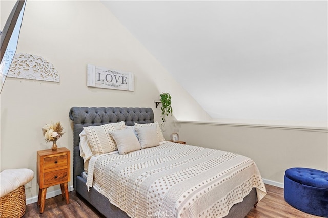 14133 Bayside Dr, Norwalk, CA 90650 - bedroom with wood finished floors, baseboards, and lofted ceiling