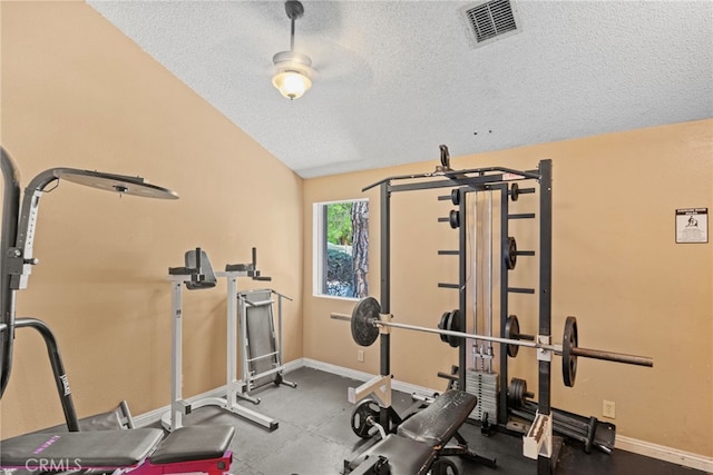 14133 Bayside Dr, Norwalk, CA 90650 - workout area featuring a textured ceiling, baseboards, and vaulted ceiling