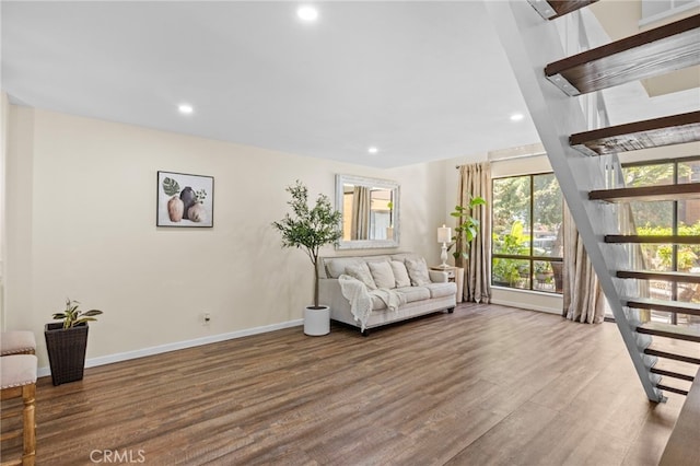 14133 Bayside Dr, Norwalk, CA 90650 - living room with plenty of natural light, wood finished floors, recessed lighting, stairway, and baseboards