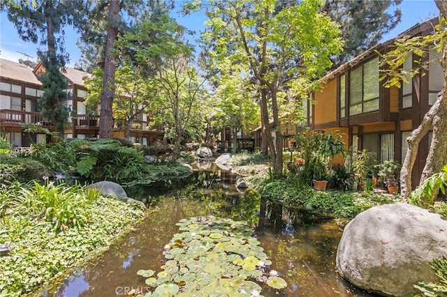 14133 Bayside Dr, Norwalk, CA 90650 - view of yard featuring a garden pond