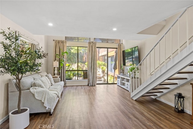 14133 Bayside Dr, Norwalk, CA 90650 - foyer with wood finished floors, stairs, recessed lighting, and baseboards
