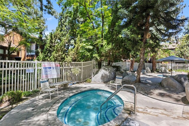 14133 Bayside Dr, Norwalk, CA 90650 - view of pool featuring fence, a pool, and a patio area