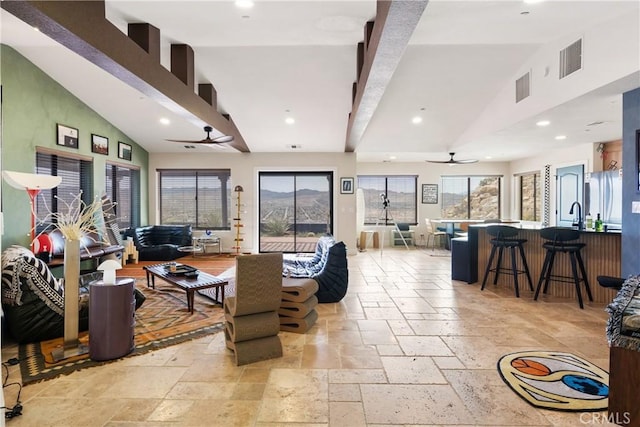 57093 Monticello Ct, Yucca Valley, CA 92284 - living room featuring stone tile floors, visible vents, recessed lighting, and ceiling fan