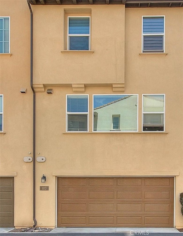803 N Dalton Ave, Azusa, CA 91702 - view of front of house with stucco siding and a garage