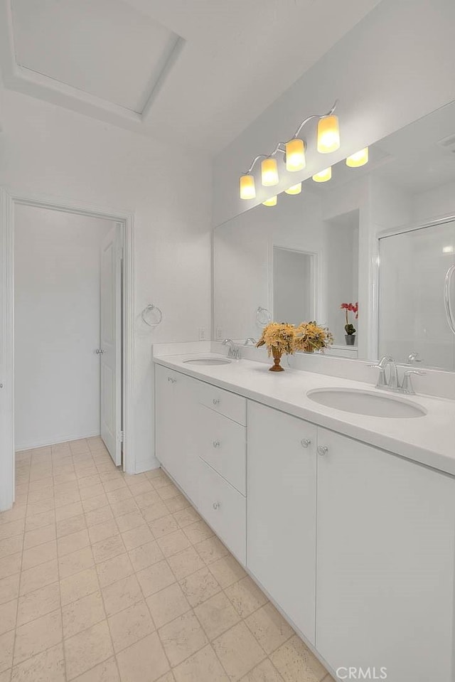 803 N Dalton Ave, Azusa, CA 91702 - bathroom featuring a shower stall, double vanity, and a sink