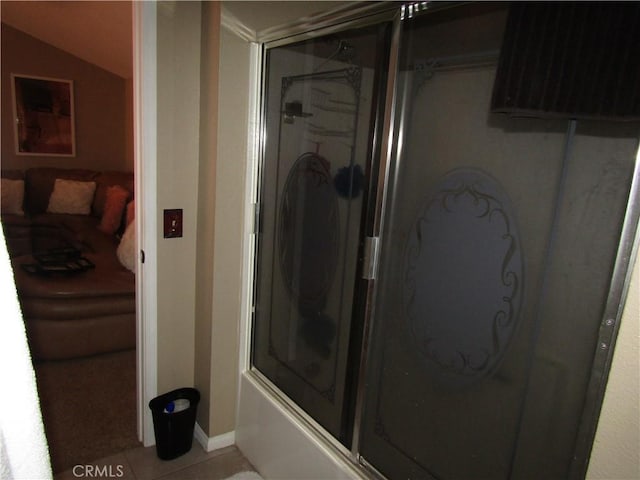 full bath featuring tile patterned floors