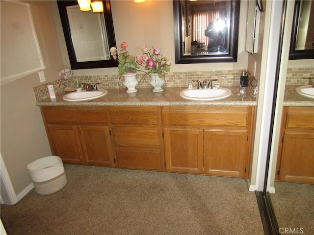 full bath with a sink, backsplash, and carpet floors
