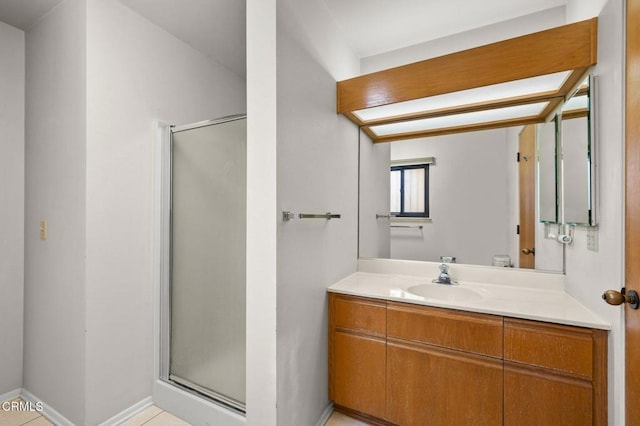 full bath with vanity and a stall shower