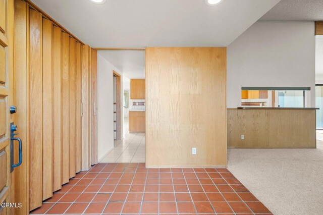 spare room with recessed lighting and tile patterned flooring