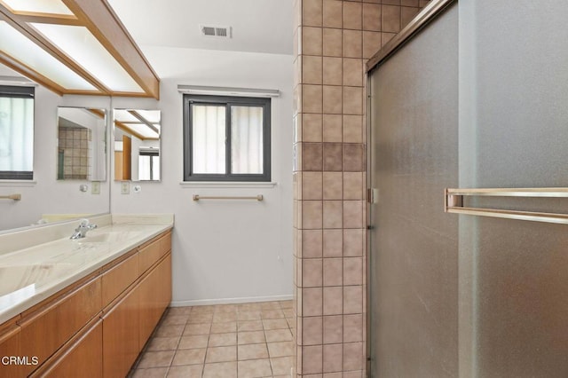 full bathroom with tile patterned floors, visible vents, a shower stall, and a healthy amount of sunlight