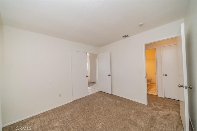 23607 Dracaea Ave, Moreno Valley, CA 92553 - unfurnished bedroom featuring carpet and baseboards