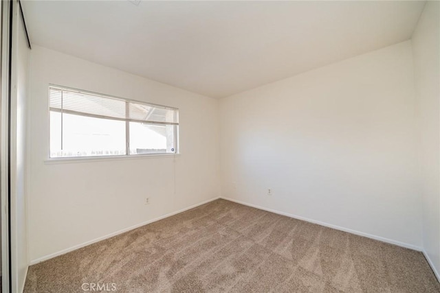 23607 Dracaea Ave, Moreno Valley, CA 92553 - carpeted spare room featuring baseboards